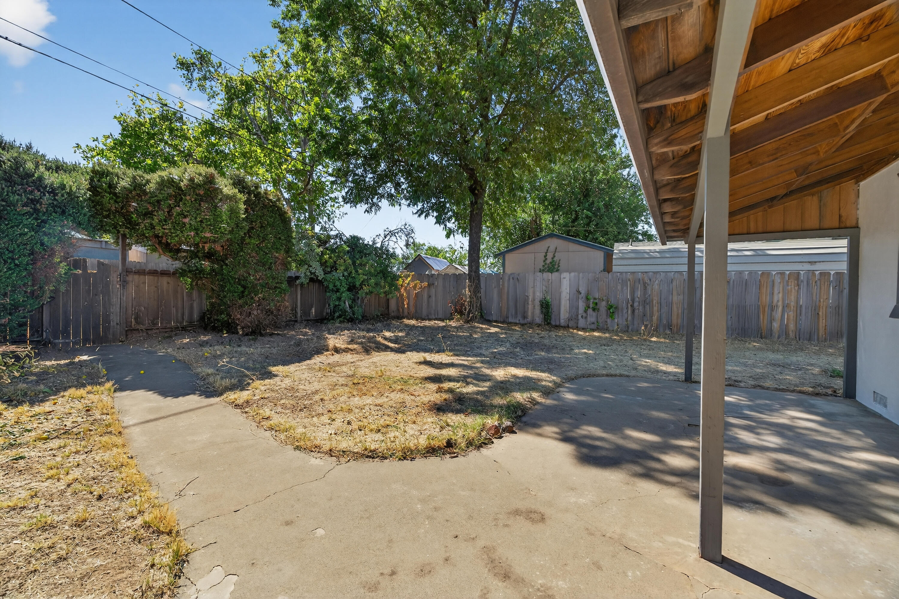810 Cascade Avenue Red Bluff, CA 96080 - Photo 19 of 23 a view of a backyard with a tree