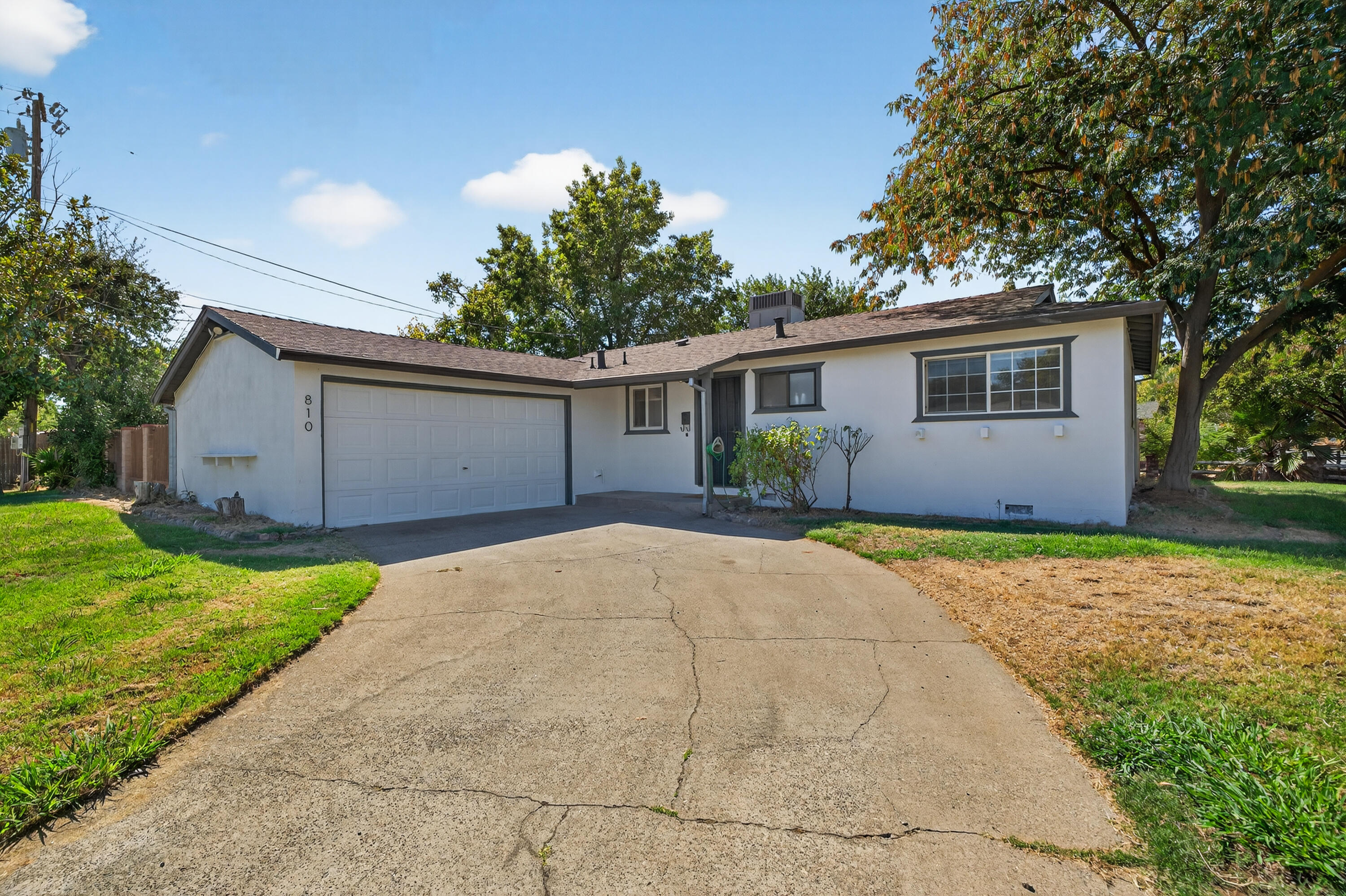 810 Cascade Avenue Red Bluff, CA 96080 - Photo 2 of 23 a view of backyard with a garden and plants
