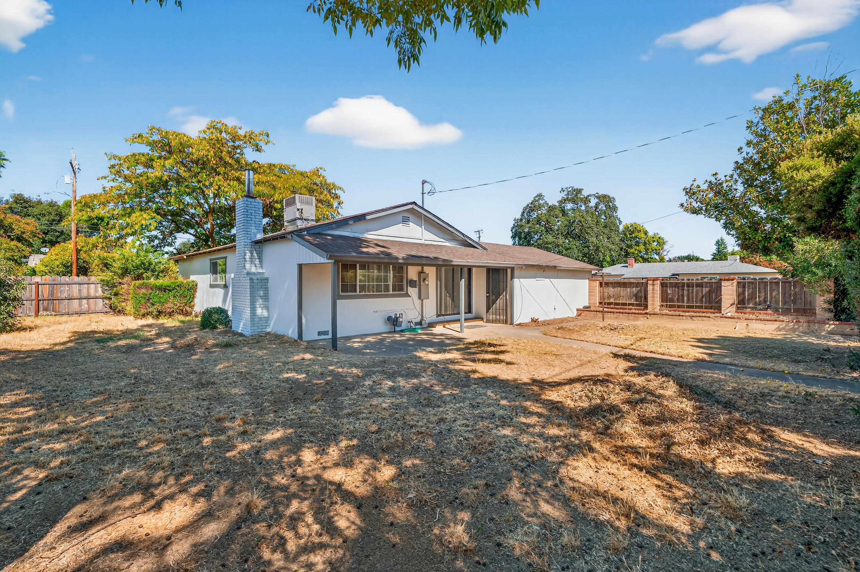 810 Cascade Avenue Red Bluff, CA 96080 - Photo 21 of 23 a front view of a house with a garden