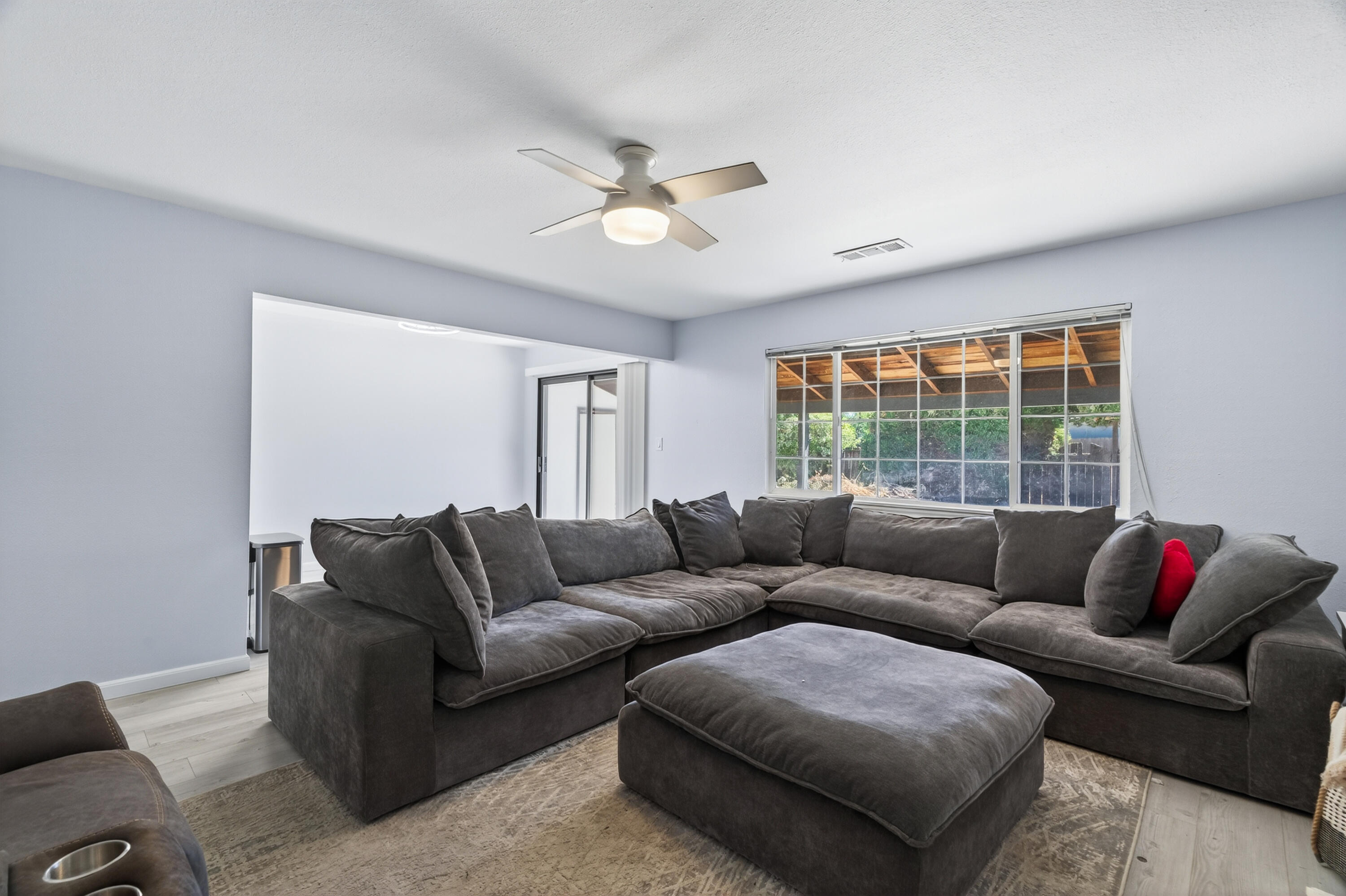 810 Cascade Avenue Red Bluff, CA 96080 - Photo 6 of 23 a living room with furniture and a large window