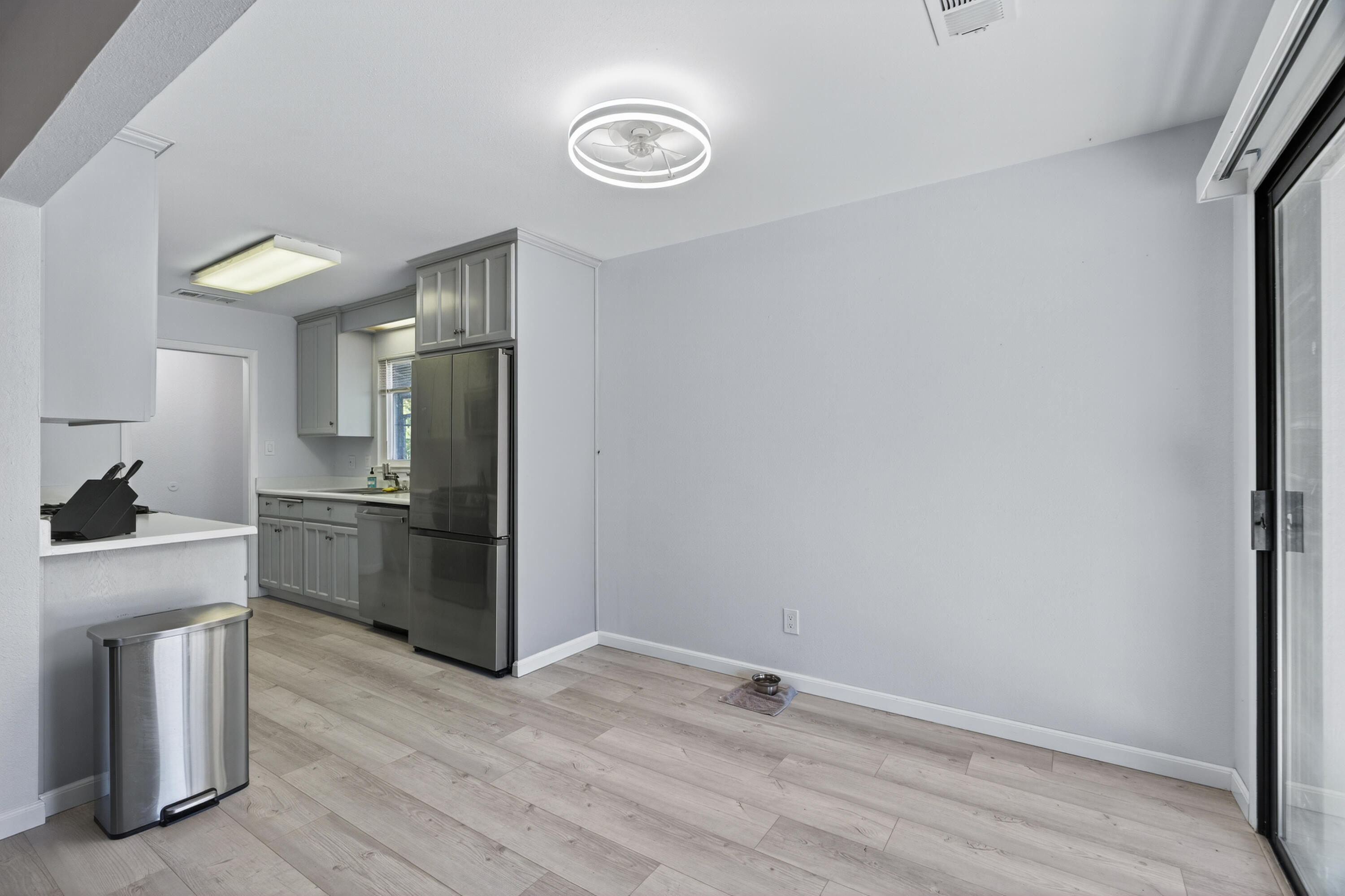 810 Cascade Avenue Red Bluff, CA 96080 - Photo 8 of 23 a kitchen with a refrigerator sink and stove