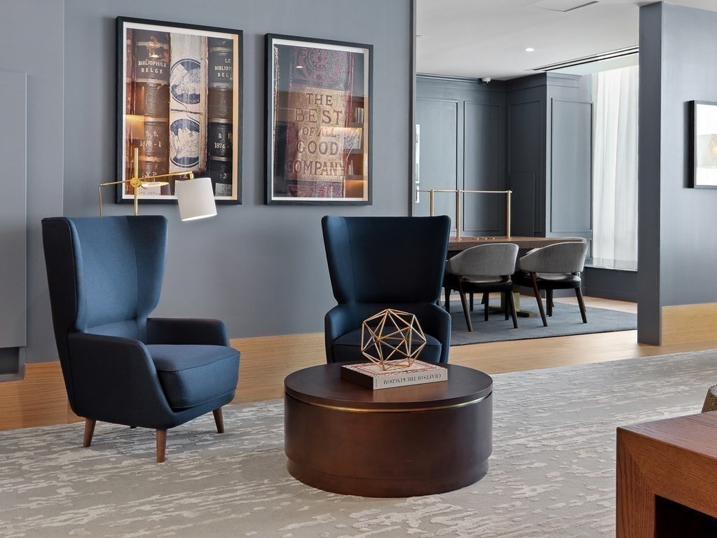 380 Harrison Avenue, Unit 14J Boston, MA 02118 - Photo 31 of 37 a living room with furniture and a window