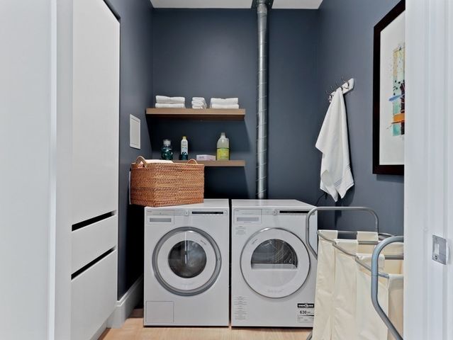 a utility room with dryer and washer