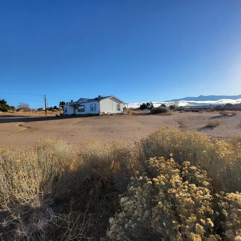 a bathroom with a toilet a sink and shower