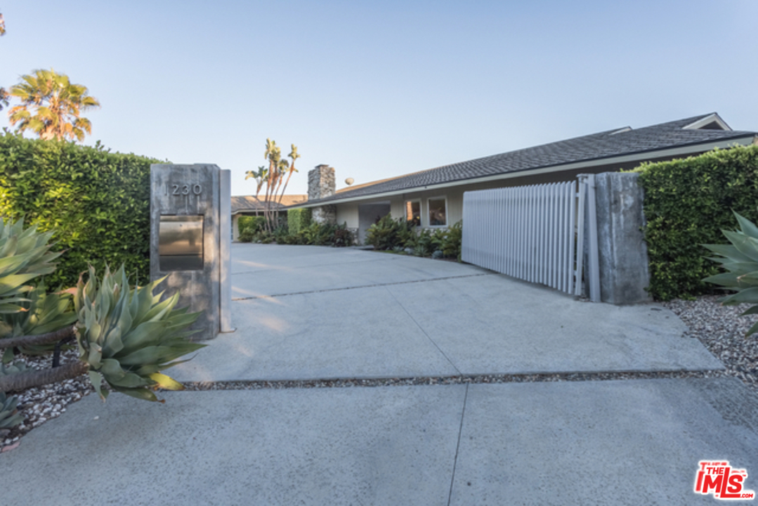 1230 Shadow Hill Way Beverly Hills, CA 90210 - Photo 2 of 22 a view of a house with a outdoor space