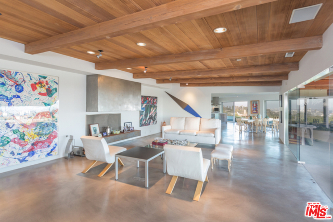 1230 Shadow Hill Way Beverly Hills, CA 90210 - Photo 5 of 22 a outdoor space with lots of furniture and appliances