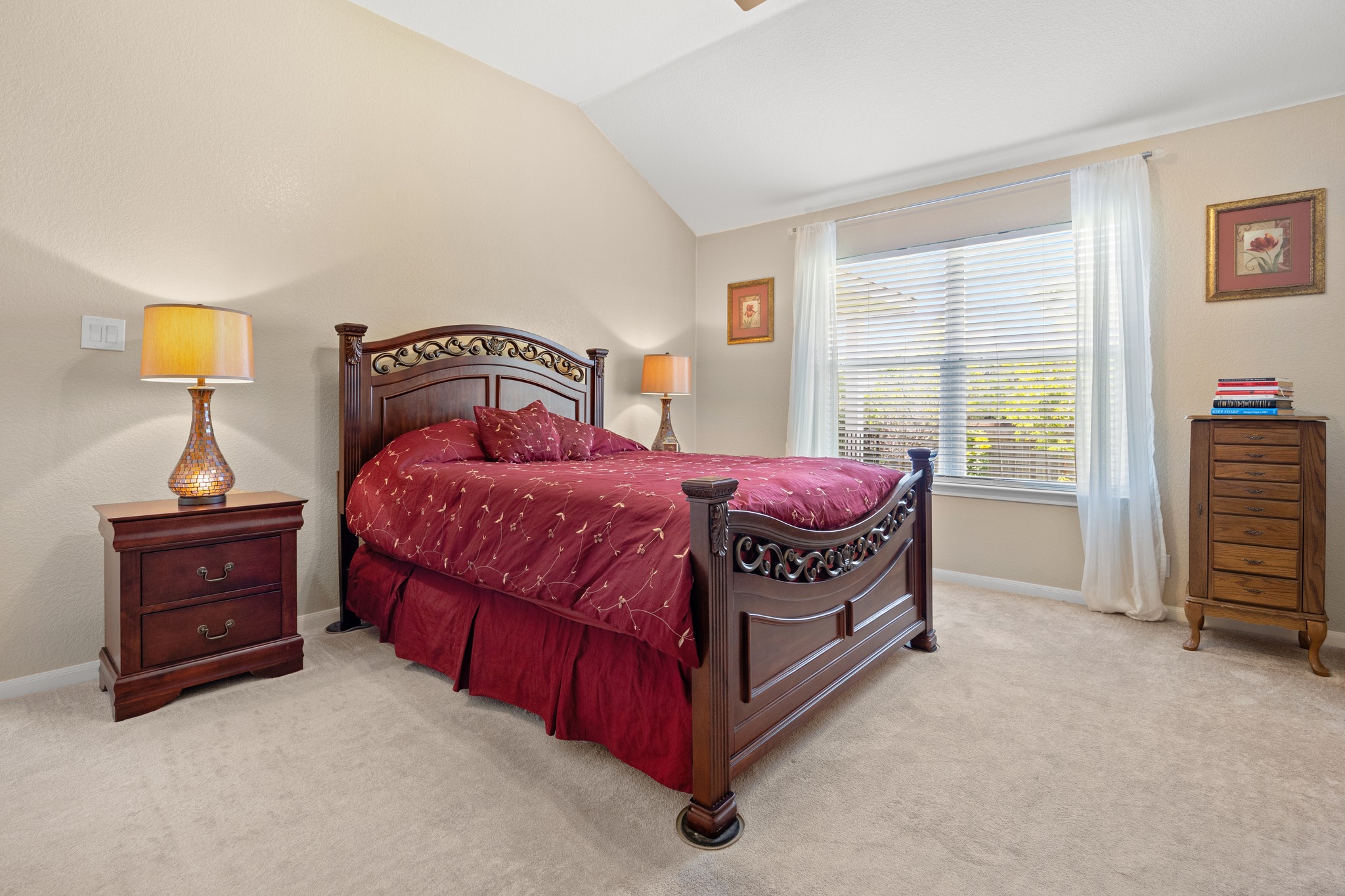 1108 Springbrook Road Pflugerville, TX 78660 - Photo 18 of 37 Relaxation awaits in this inviting primary bedroom, offering plush carpeting and an abundance of natural light.