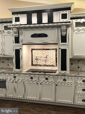 7321 New Cut Road Kingsville, MD 21087 - Photo 14 of 50 a kitchen with stainless steel appliances granite countertop a stove a sink and a microwave