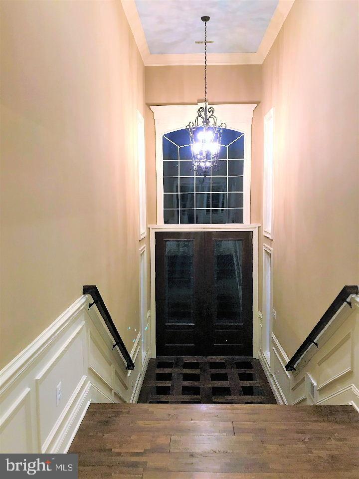7321 New Cut Road Kingsville, MD 21087 - Photo 8 of 50 a view of a hallway with wooden floor and a window