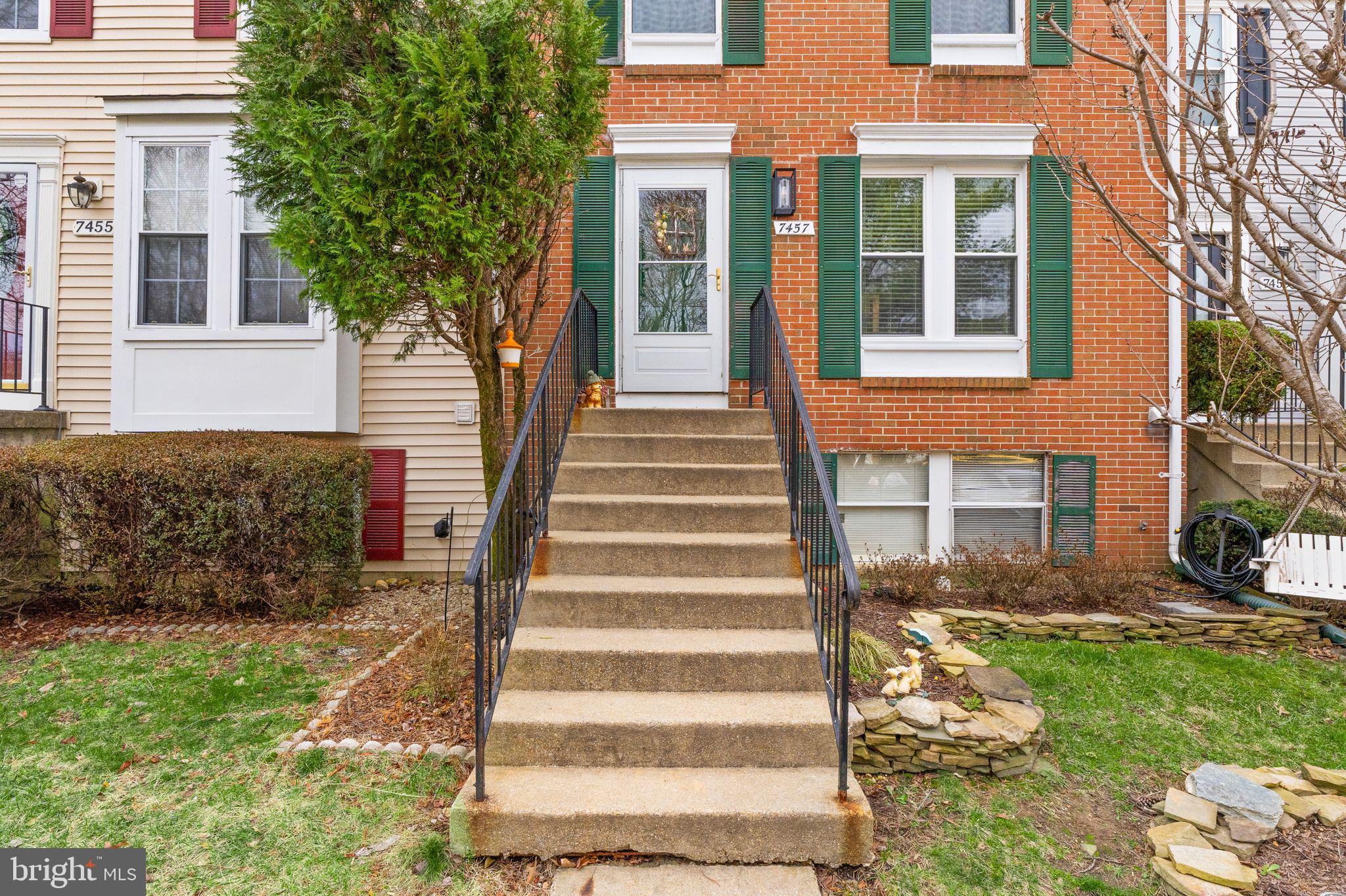7457 Wounded Knee Road Lorton, VA 22079 - Photo 5 of 49 a view of a house with a yard