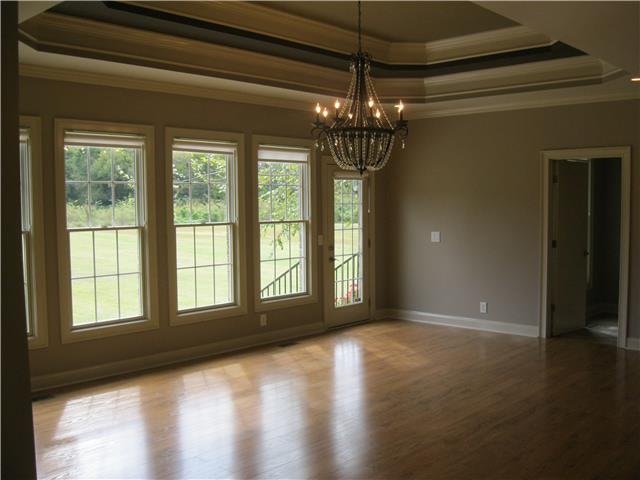 8070 Powells Chapel Road Murfreesboro, TN 37129 - Photo 16 of 19 a view of an empty room with wooden floor and a window