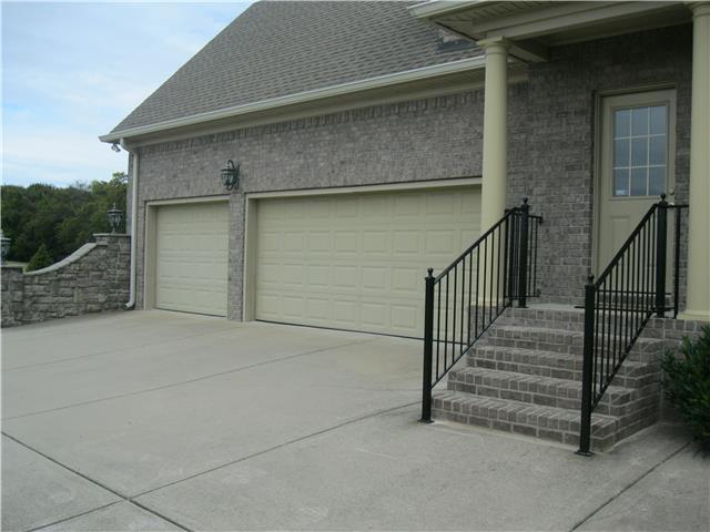 8070 Powells Chapel Road Murfreesboro, TN 37129 - Photo 3 of 19 front view of a house with a garage