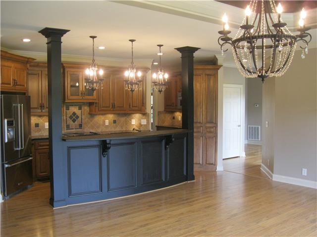 8070 Powells Chapel Road Murfreesboro, TN 37129 - Photo 5 of 19 a kitchen with a refrigerator and chandelier