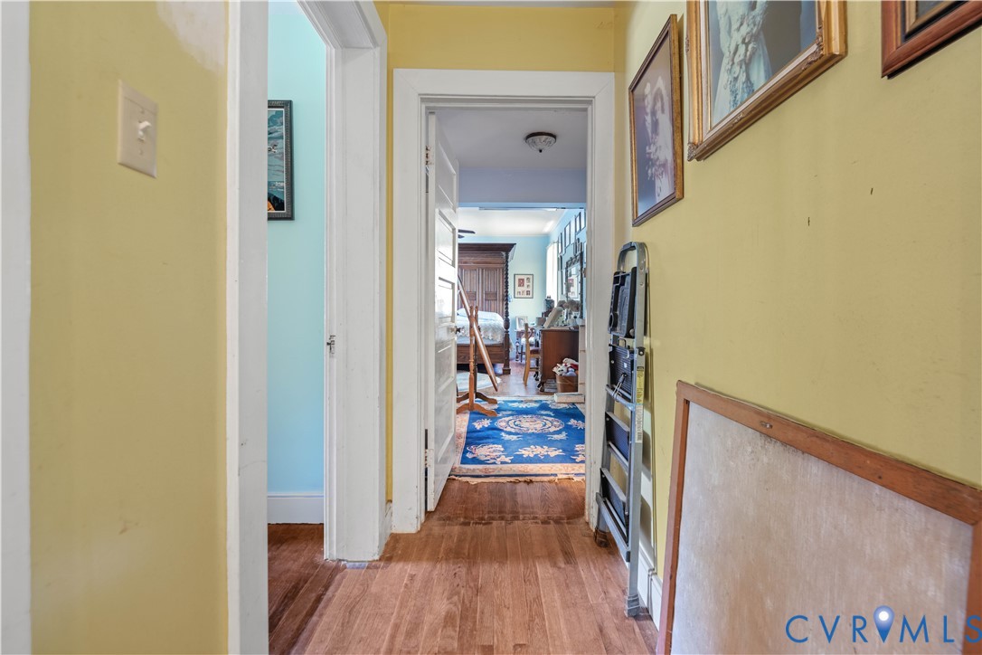 6243 Studley Road Mechanicsville, VA 23116 - Photo 16 of 65 a view of a hallway view with wooden floor and living room