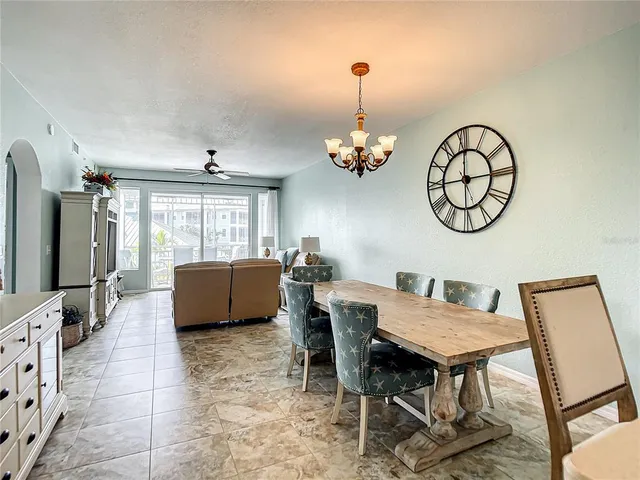 a kitchen with white cabinets