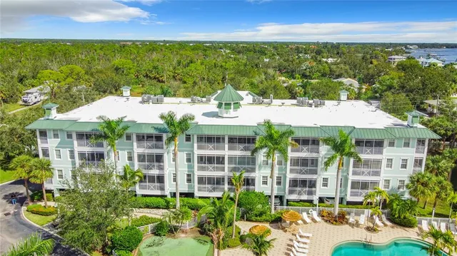 a terrace with outdoor seating and city view