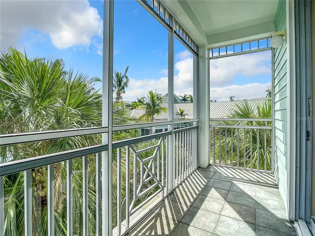 a bedroom with a large bed and a dresser
