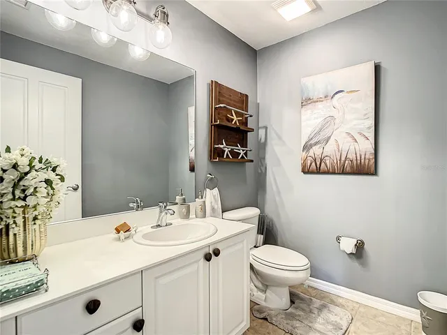 a swimming pool with outdoor seating and yard