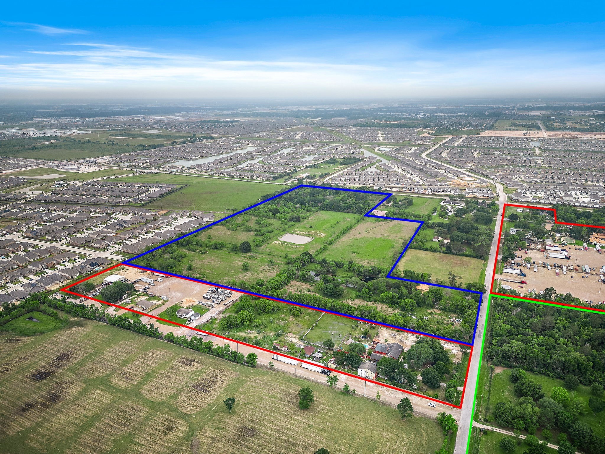 4015 Roland Road Katy, TX 77493 - Photo 2 of 11 an aerial view of a city