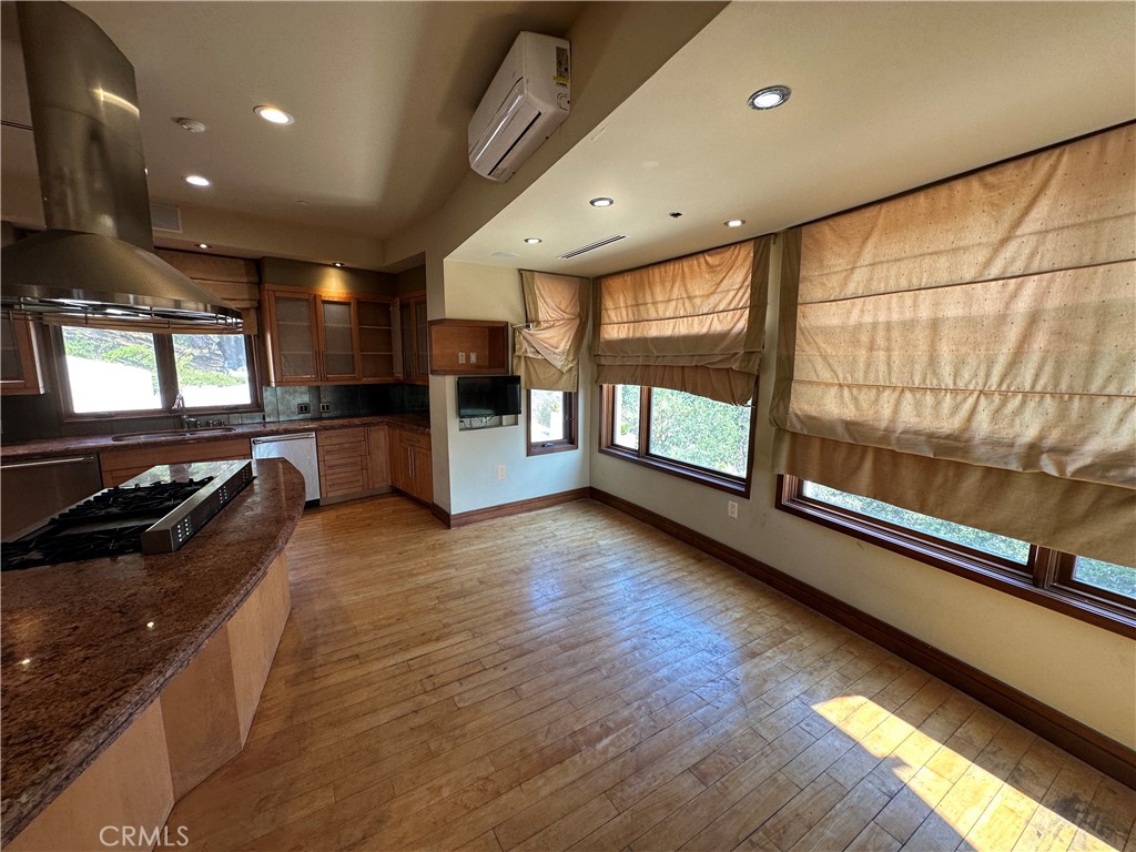 5077 Schumacher Road Calabasas, CA 91302 - Photo 12 of 58 a large kitchen with a large window