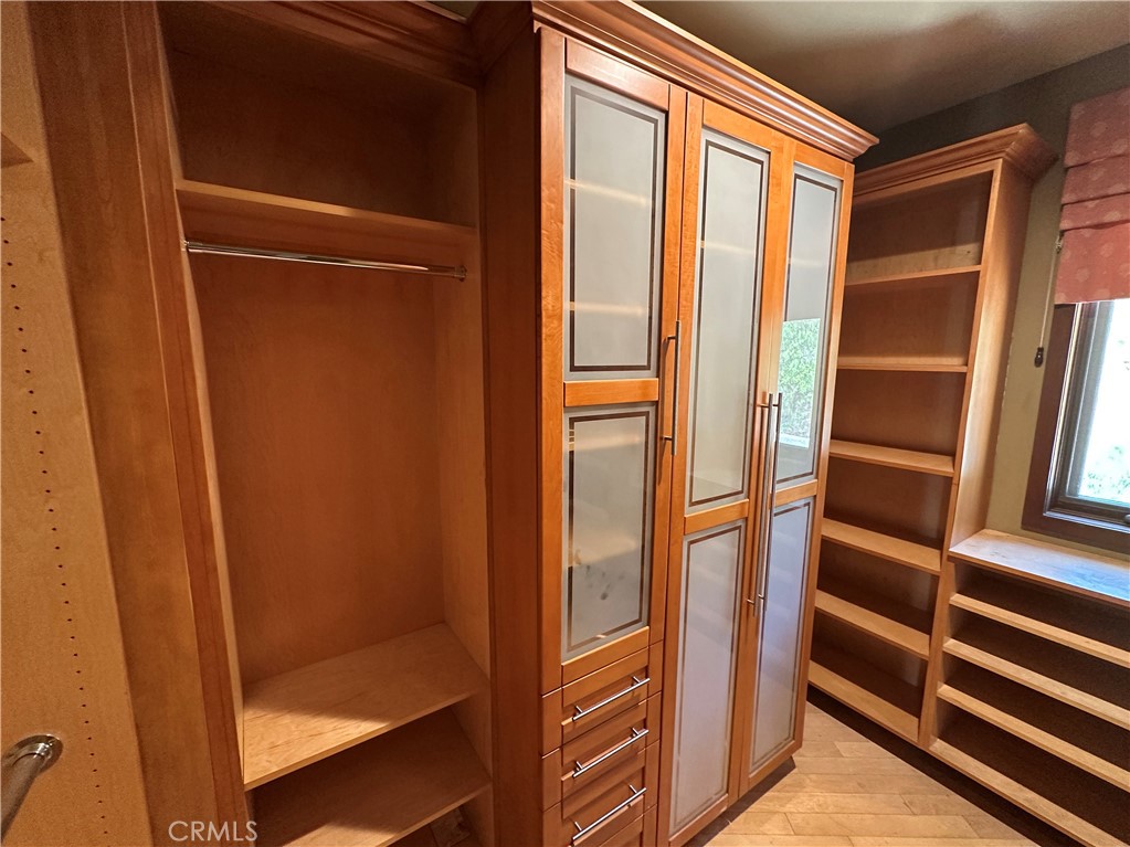5077 Schumacher Road Calabasas, CA 91302 - Photo 24 of 58 a view of walk in closet