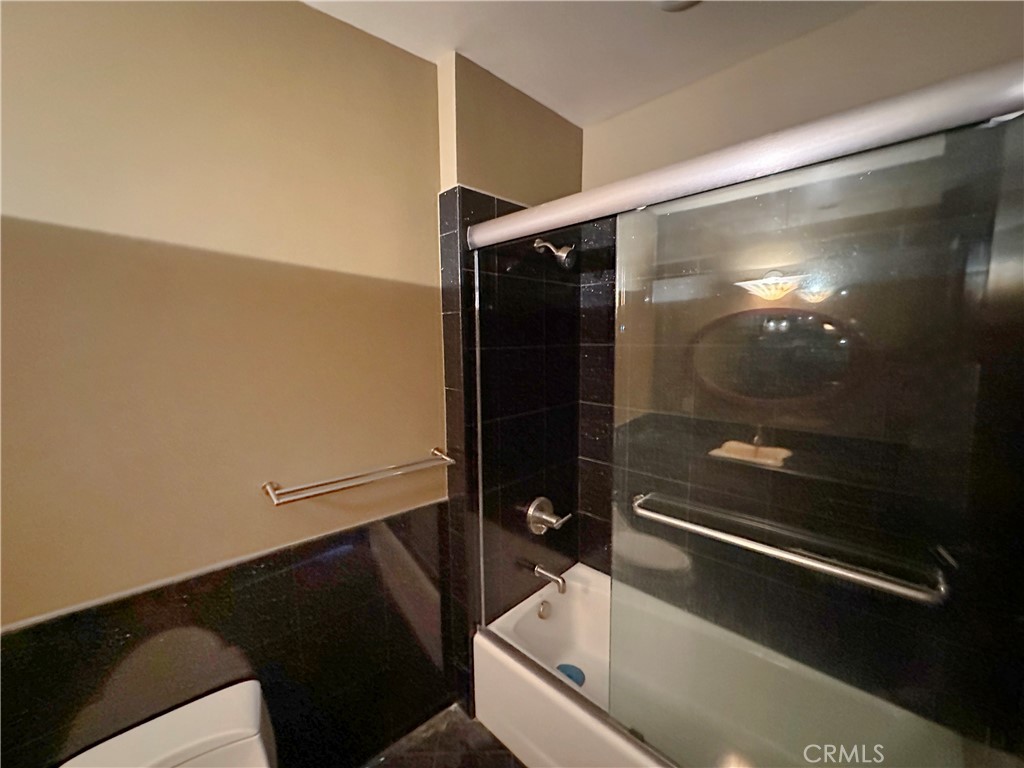 5077 Schumacher Road Calabasas, CA 91302 - Photo 32 of 58 a bathroom with a bathtub