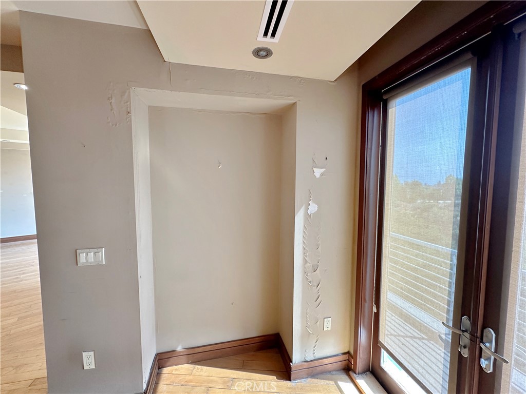 5077 Schumacher Road Calabasas, CA 91302 - Photo 35 of 58 a view of bedroom with a bed and a window