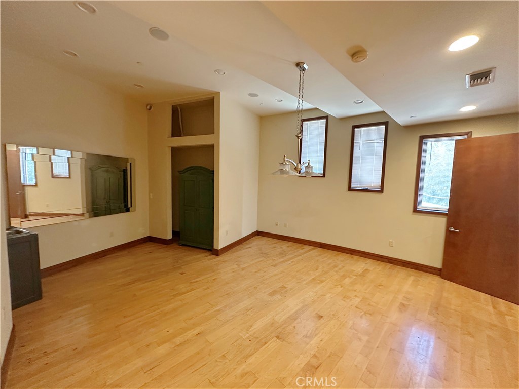5077 Schumacher Road Calabasas, CA 91302 - Photo 42 of 58 a view of an empty room with window