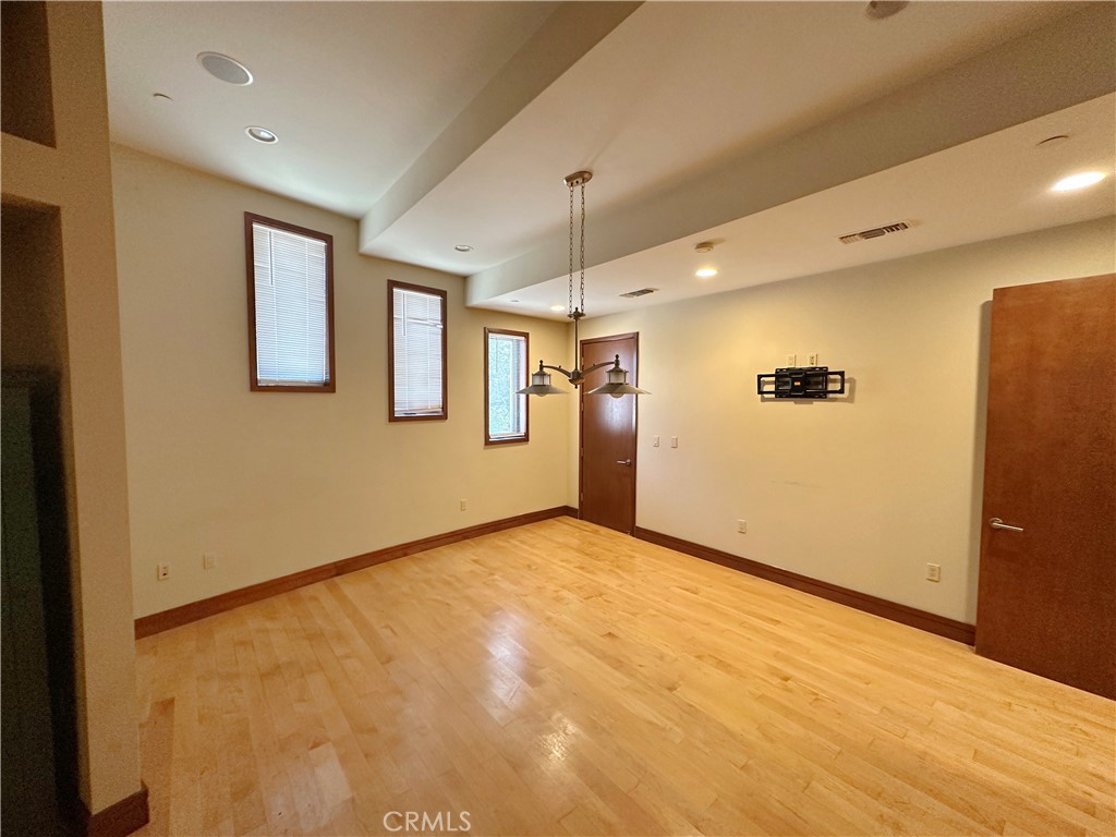 5077 Schumacher Road Calabasas, CA 91302 - Photo 44 of 58 a view of an empty room with a window