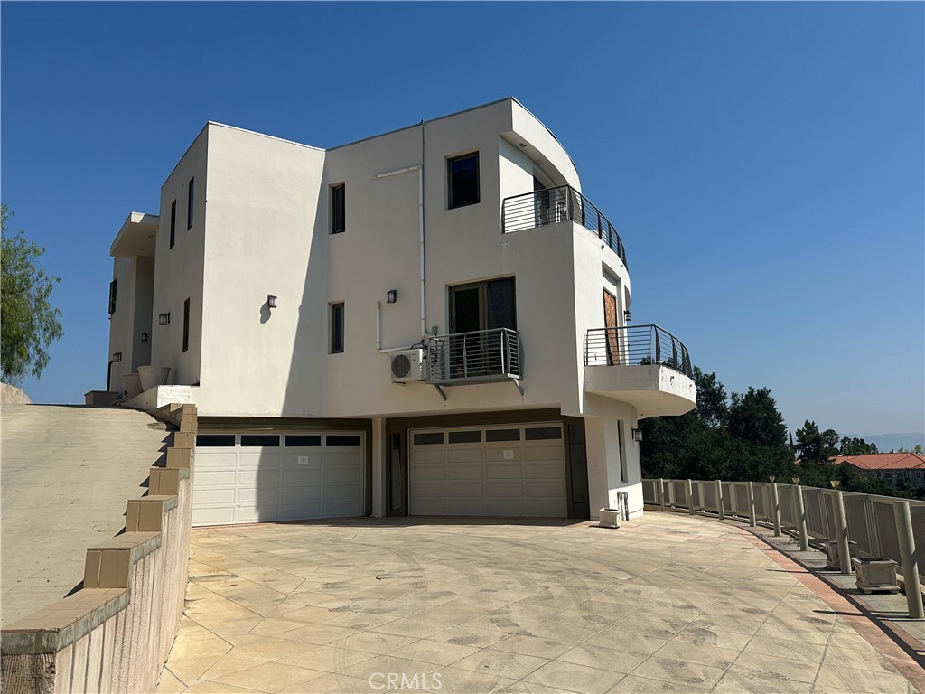 5077 Schumacher Road Calabasas, CA 91302 - Photo 54 of 58 a house with a outdoor space