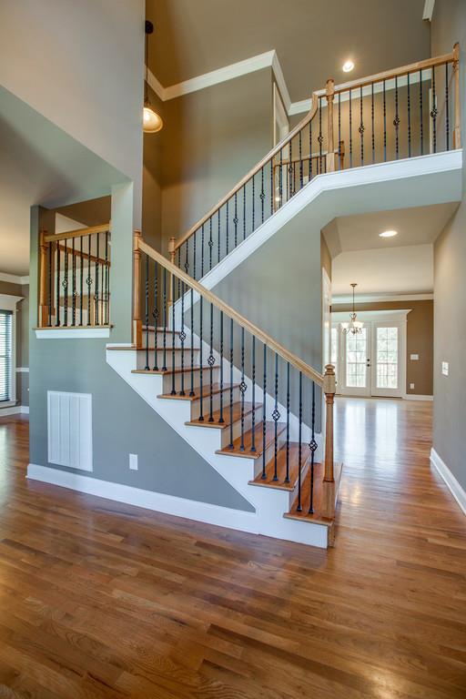 4023 Campania Strada Spring Hill, TN 37174 - Photo 6 of 30 staircase with iron spindles