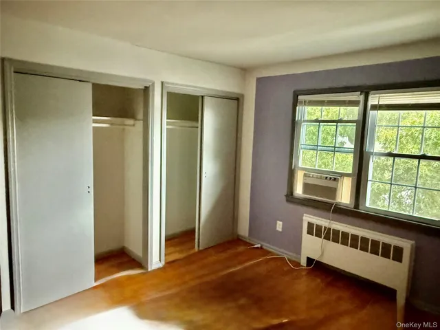 a bedroom with window