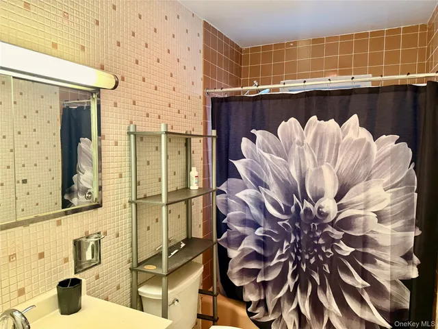 a view of balcony with furniture