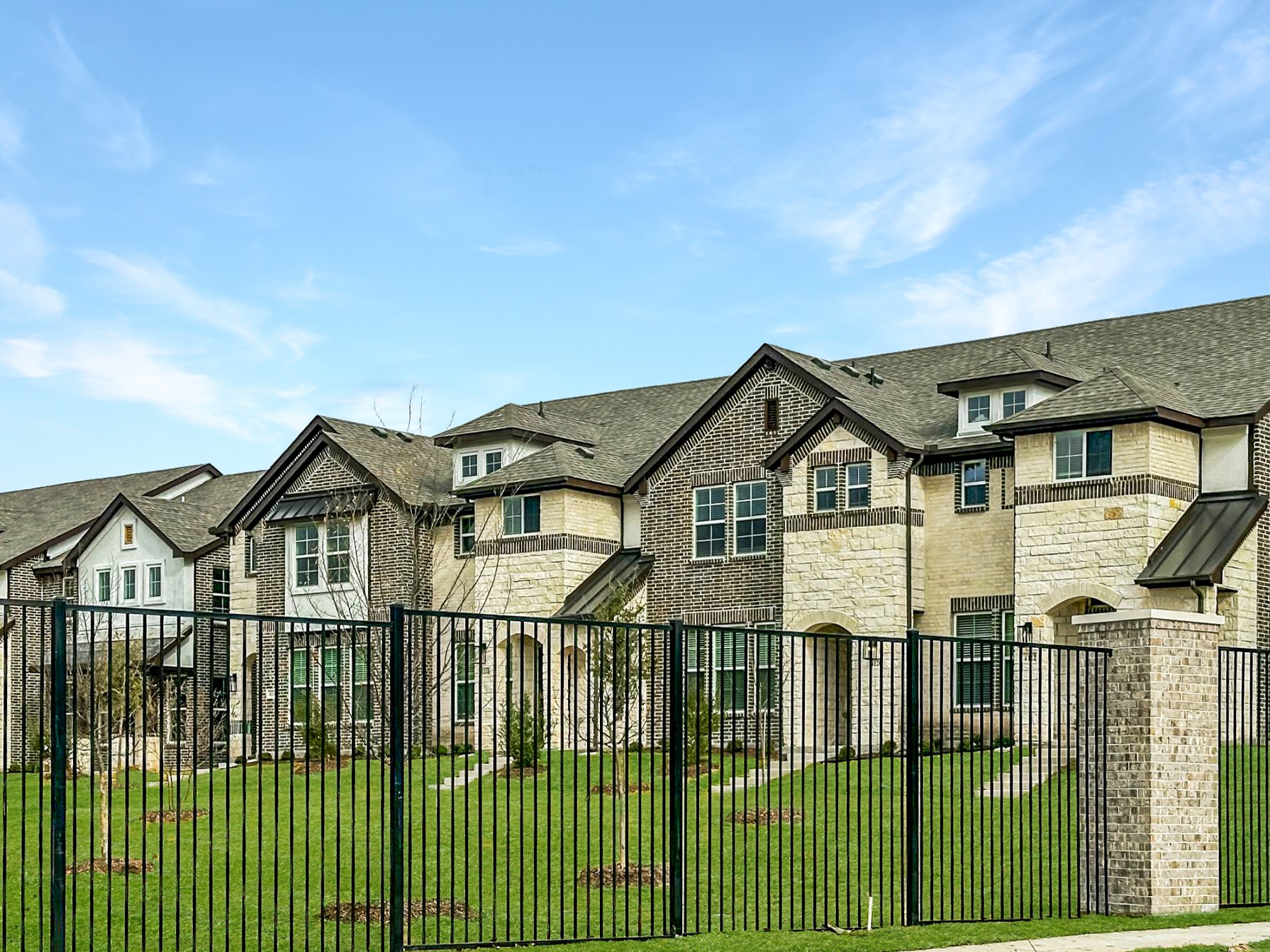 4125 Floyd Alley Grand Prairie, TX 75052 - Photo 2 of 45 a view of a white house with large windows and a small yard