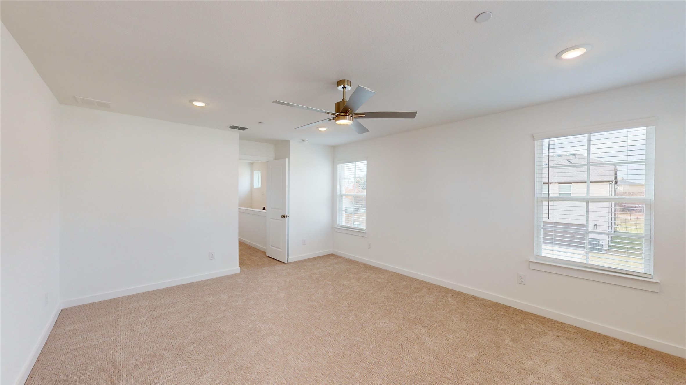 4125 Floyd Alley Grand Prairie, TX 75052 - Photo 23 of 45 an empty room with windows and ceiling fan