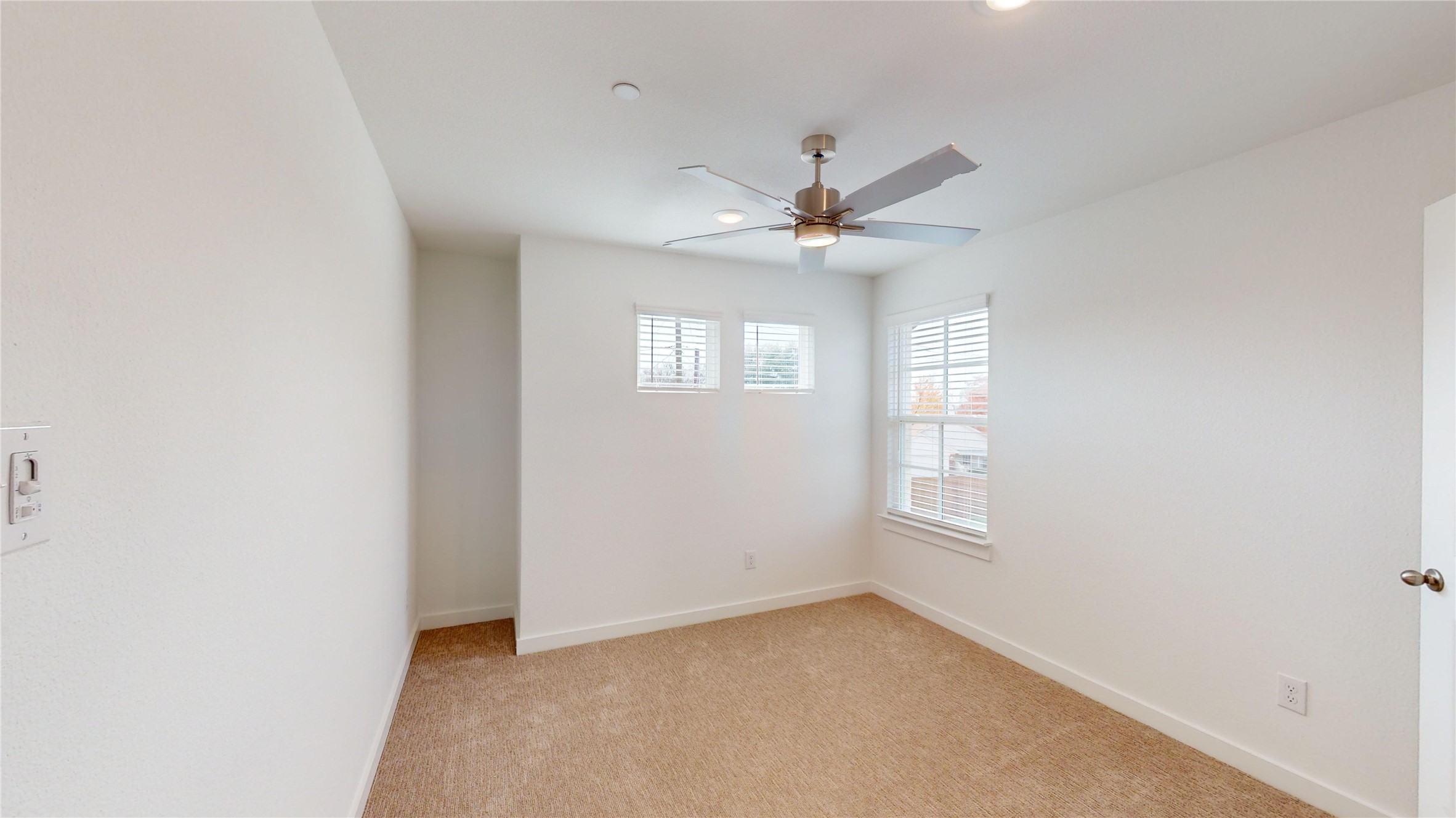 4125 Floyd Alley Grand Prairie, TX 75052 - Photo 27 of 45 an empty room with windows and fan