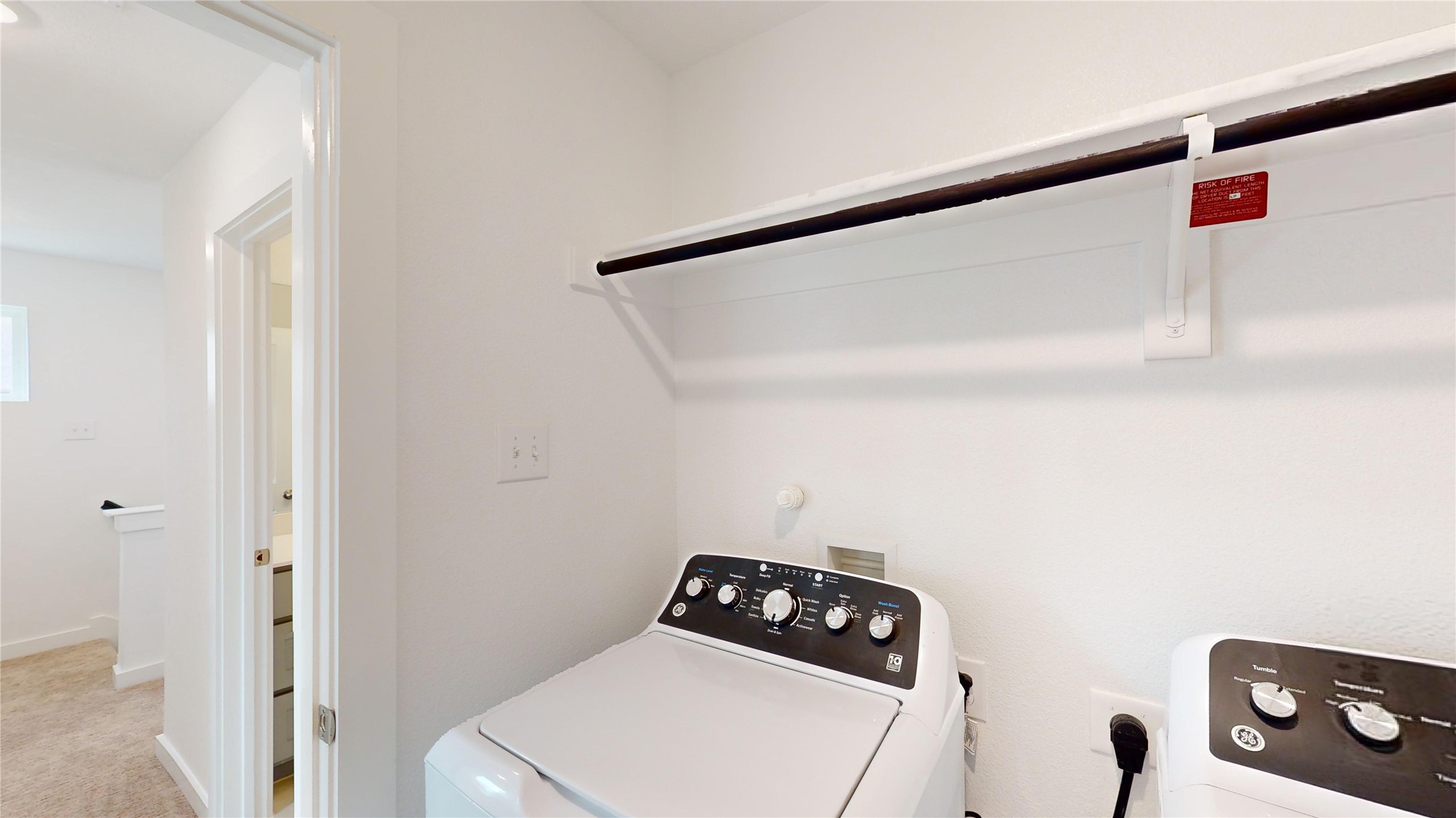 4125 Floyd Alley Grand Prairie, TX 75052 - Photo 30 of 45 a utility room with dryer and washer