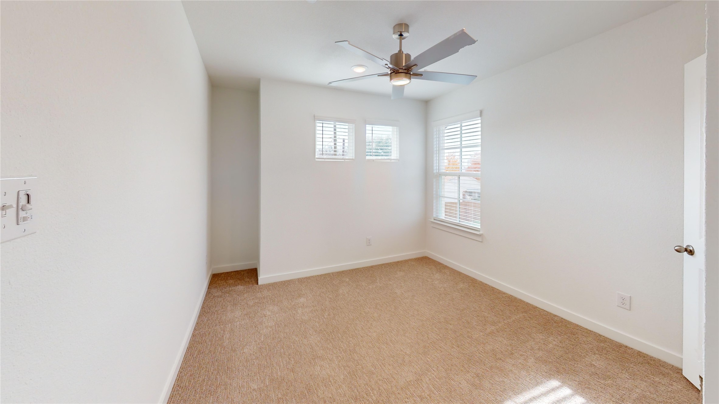 4125 Floyd Alley Grand Prairie, TX 75052 - Photo 35 of 45 an empty room with windows and fan