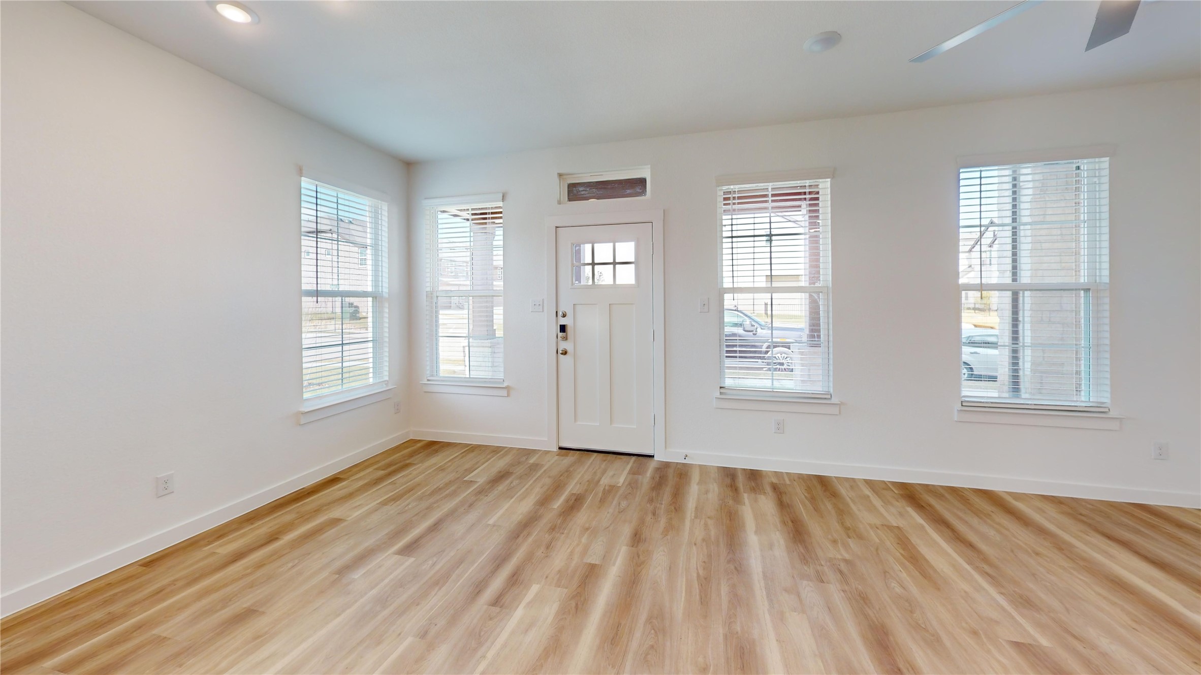 4125 Floyd Alley Grand Prairie, TX 75052 - Photo 43 of 45 a view of empty room with wooden floor and fan
