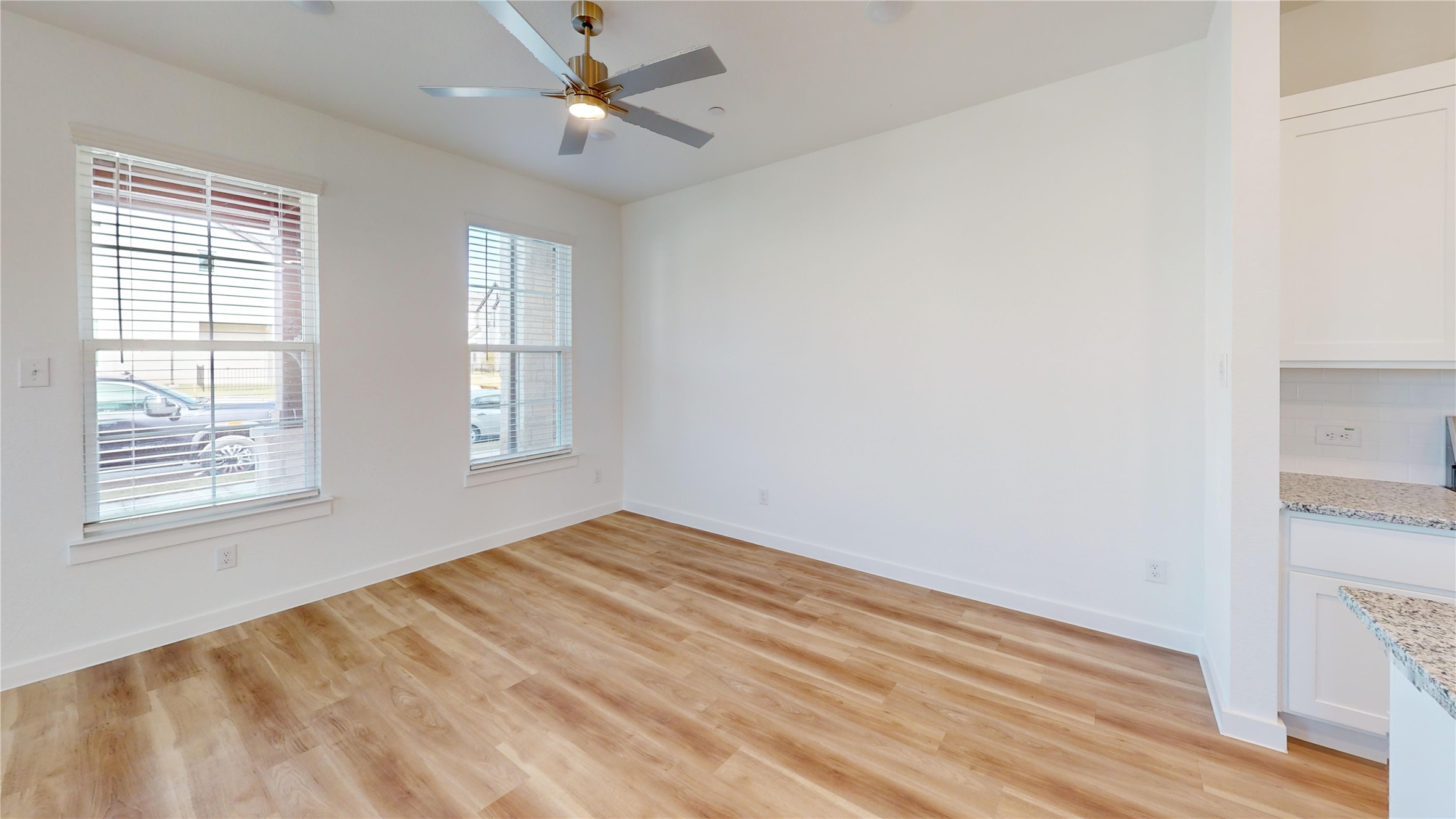 4125 Floyd Alley Grand Prairie, TX 75052 - Photo 44 of 45 a view of empty room with wooden floor and fan