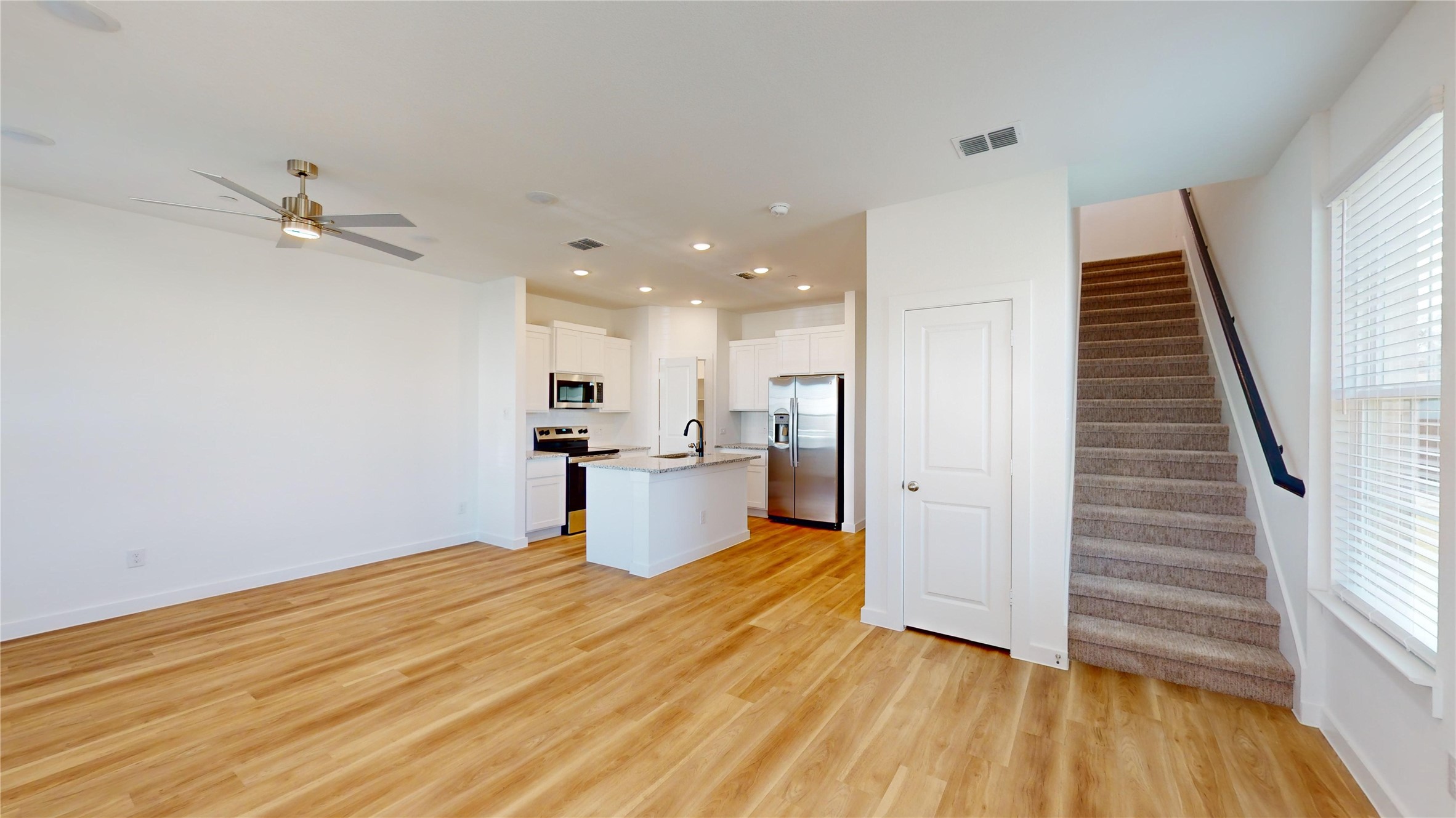 4125 Floyd Alley Grand Prairie, TX 75052 - Photo 8 of 45 a view of a kitchen with wooden floor and a sink