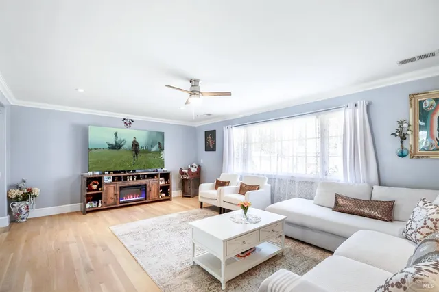 a living room with furniture and a couch
