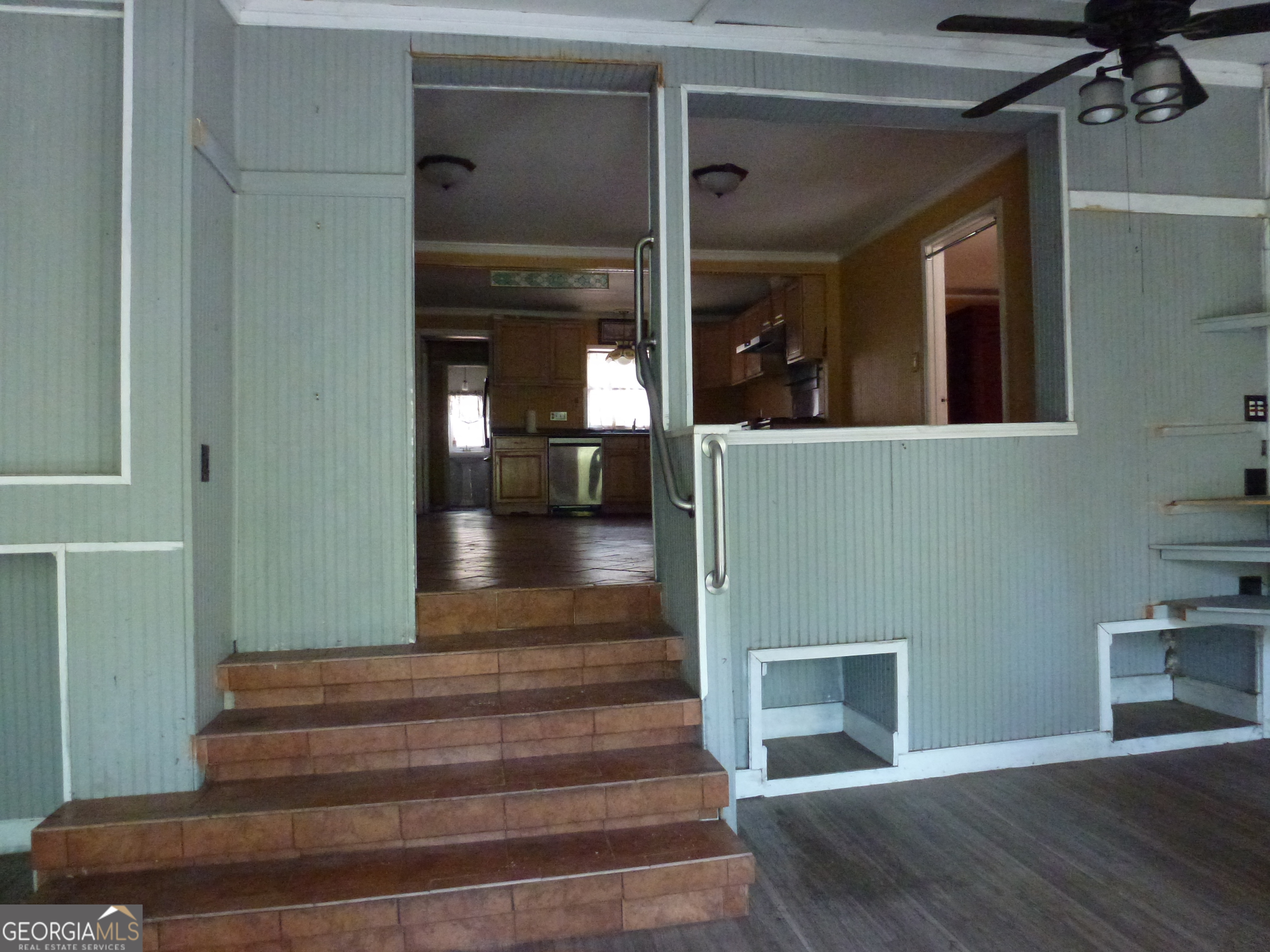 352 Riverside Drive Claxton, GA 30417 - Photo 4 of 25 a view of entryway and hall with wooden floor