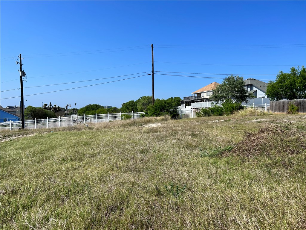 1009 Bluff Drive Portland, TX 78374 - Photo 4 of 4 a view of a garden with a building in the background