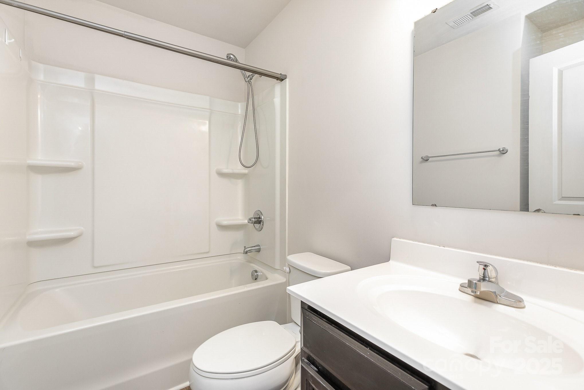 828 Renee Avenue Fort Mill, SC 29715 - Photo 15 of 23 a bathroom with a sink a toilet and a bathtub