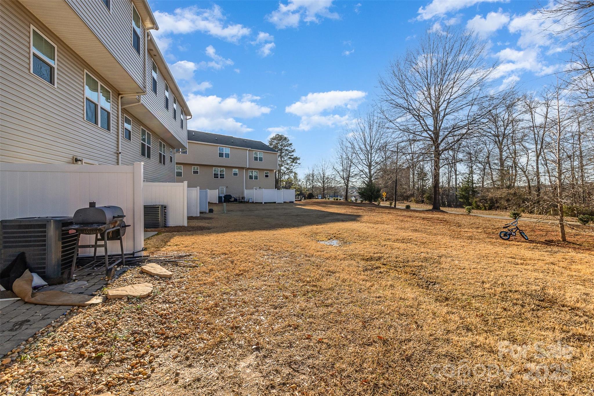 828 Renee Avenue Fort Mill, SC 29715 - Photo 22 of 23 a street view with residential houses