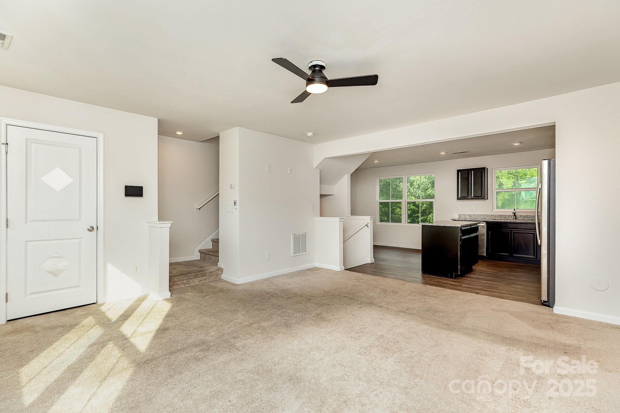 828 Renee Avenue Fort Mill, SC 29715 - Photo 6 of 23 a view of a big room with windows and cabinet