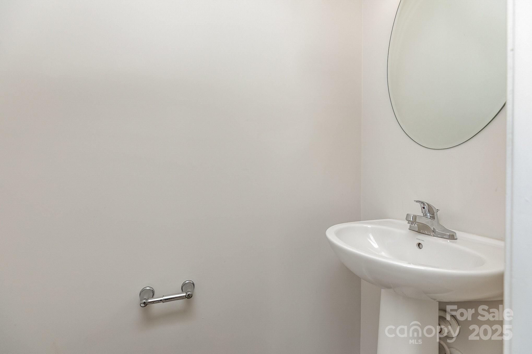 828 Renee Avenue Fort Mill, SC 29715 - Photo 7 of 23 a bathroom with a sink and a mirror