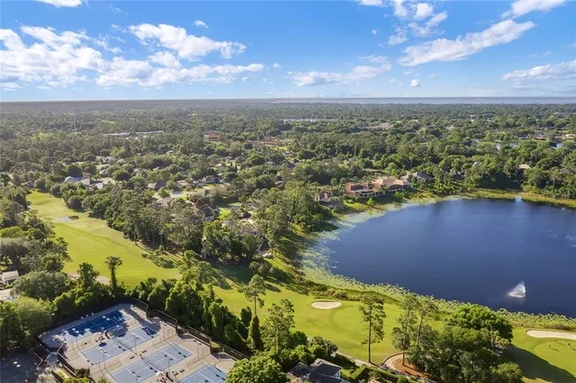 a street sign that is sitting in the grass