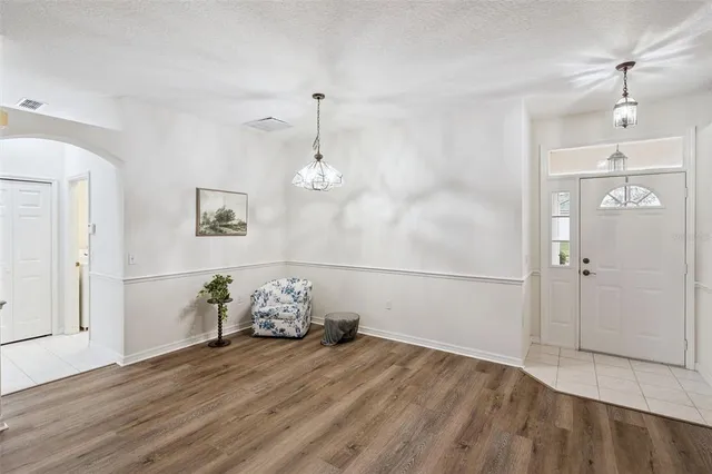 a view of livingroom with furniture and wooden floor